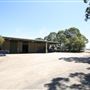 Freestanding high clearance warehouse, production office, gated site, 80 car spaces